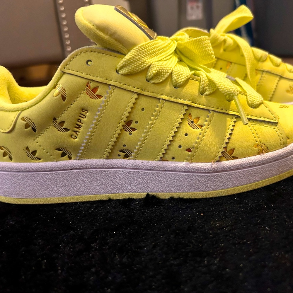 Rarity in the Adidas Allstar yellow with gold logo symbol for adidas